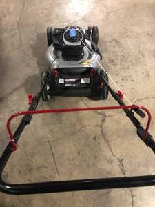 lot 10 image: Murray 22 in. 140 cc Briggs & Stratton Walk Behind Gas Self-Propelled Lawn Mower with Front Wheel Drive Customer Returns See Pictures