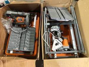 lot 39 image: Lot of 2 Ridgid Tile Saw Tables For Parts Customer Returns See Pictures