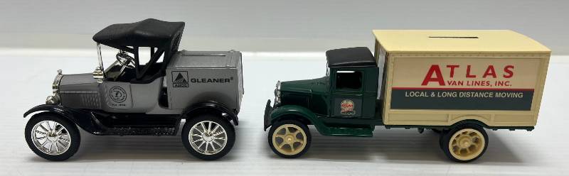 lot 19 image: Two Ertl Collectibles Die-Cast Metal Banks  1 1993 ( 70th Anniversary Agco Gleaner Combine ) 1918 Runabout 1 1995 (  Atlas Van Lines ) 1931 Hawkeye Truck
