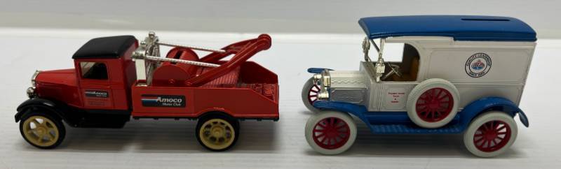 lot 22 image: Two Ertl Collectibles Die-Cast Metal Banks 1 1989 100TH Anniversary Commemorative Edition ( AMOCO ) 1917 Model T Tanker 11992  ( AMOCO MOTOR CLUB ) 1931 Hawkeye Wrecker