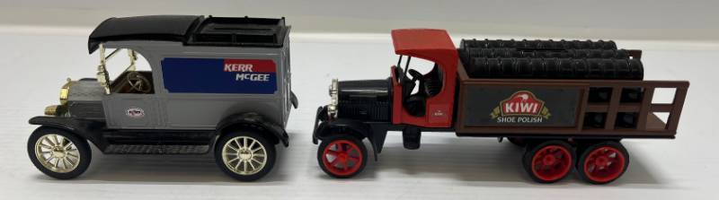 lot 25 image: Two Ertl Collectibles Die-Cast Metal Banks 1 1989 (  Kerr McGee ) 1913 Model T Delivery  1 1993 ( Kiwi Polish ) 1925 Kenworth Stake Truck