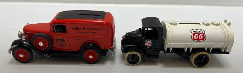 lot 28 image: Two 1991 Ertl Collectibles Die-Cast Metal Banks 1 ( Phillips Petroleum ) 1926 Mack Tanker 1 ( Phillips 66 ) 1932 Ford Powder Truck