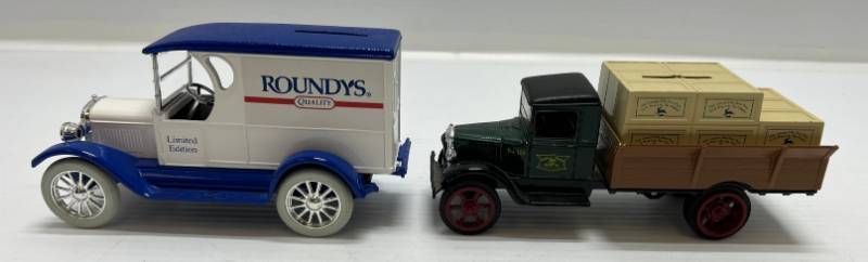 lot 49 image: Two Ertl Collectibles Die-Cast Metal Banks ( No Boxes ) 1 ( Rounds ) 1923 Chevrolet Delivery Van 1 ( John Deere ) 1935 Hawkeye