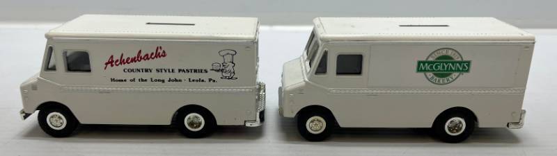 lot 54 image: Two Ertl Collectibles Die-Cast Metal Banks ( No Boxes ) 1  ( McGlynns Bakery )(Broken Front Bumper) Grummann Olson Kurbmaster 1 ( Achenbachs ) Grummann Olson Kurbmaster