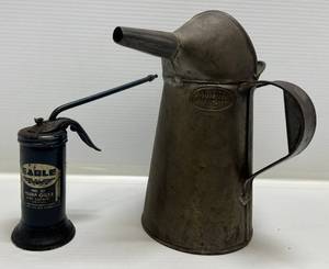 lot 89 image: Vintage Oil Cans 1 New York City Apprd 103 M 3 2 QT Liquid