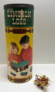 lot 105 image: Vintage Toys Including 1960s Tin Litho Airplane Made In Germany & Original  Lincoln Logs