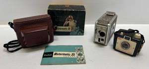 lot 164 image: Group Of Vintage Cameras Including Kodak Motoramic 35 Camera In Original Box & More
