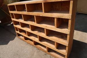 lot 21 image: WOOD CUBBY SHELF.