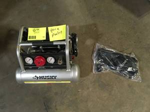 lot 12 image: Husky 1 Gal. Portable Electric-Powered Silent Air Compressor     Customer Returns See Pictures