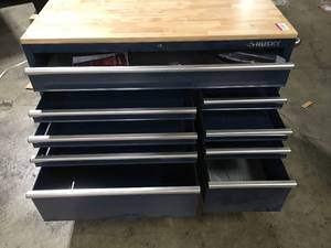 lot 14 image: Husky 52 in. W x 25 in. D Standard Duty 9-Drawer Mobile Workbench Cabinet with Solid Wood Top in Gloss Blue   Customer Returns See Pictures