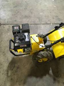 lot 42 image: Champion Power Equipment 19 in. 212cc 4-Stroke Gas Garden Rotating Rear Tine Tiller Missing Belt  Customer Returns See Pictures
