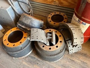 lot 201 image: Truck Wheel Drums & Brake Pads