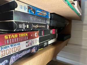 2 boxes of VHS Movies