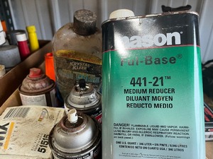 2 boxes of open chemicals  paint rad cleaner  brake fluid