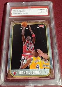 lot 69 image: 2007-08 Fleer Michael Jordan - 1st Graded 10
