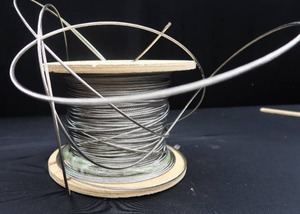 lot 100 image: LOTS AND LOTS OF YARDS OF CABLE FOR DECK RAILINGS