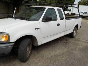 lot 2 image: 1997 Ford F150 Pickup Truck with ladder rack