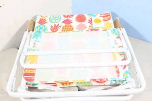 lot 53 image: Sun Squad 5 Position Polyester Beach Chair, Rust Resistant Steel Frame, Pineapple Pattern