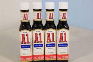 lot 102 image: 4 Bottles of A1 Steak Sauce Best By 62025