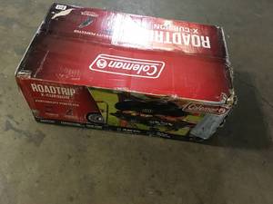 lot 27 image: Coleman Roadtrip X-Cursion Portable Propane Grill in Blue Customer Returns See Pictures