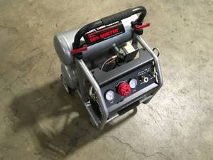 lot 34 image: Husky 4.5 Gal. Portable Electric-Powered Silent Air Compressor Customer Returns See Pictures