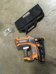 lot 35 image: RIDGID 18V Brushless Cordless HYPERDRIVE 16-Gauge 2-12 in. Straight Finish Nailer(Tool Only), Belt Clip, Bag, Sample Nails  Customer Returns See Pictures
