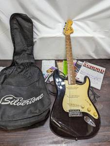 lot 55 image: Squier Strat Guitar