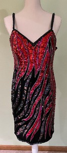 lot 27 image: One Hot Number  Sequined Dress by Alyce Designs