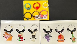 lot 319 image: Wine Party Galore Oversized Wine Glass, Placecard holders and Wine Glass Charms