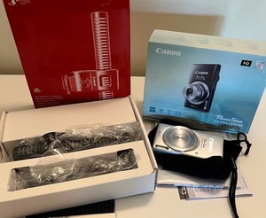 lot 94 image: CANON DM 150 Directional Microphone and CANON Powershot Camera
