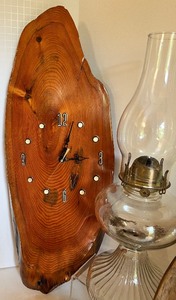 lot 134 image: Live Edge Clock, Oil Lamp, McDonald Pottery Dish and Bird Art