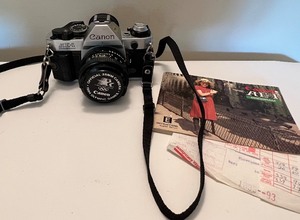 lot 85 image: Canon AE-1 Camera with Manual