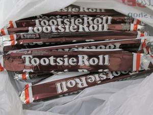 12- 2.5 oz Tootsie Rolls...