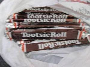 12- 2.5 oz Tootsie Rolls...