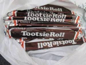 12- 2.5 oz Tootsie Rolls...
