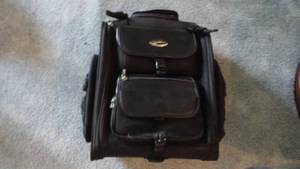 lot 198 image: Suitcase & backpack by saddle man