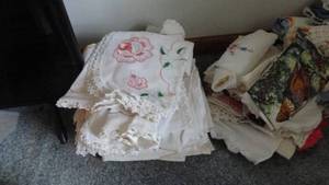 lot 215 image: Lot of homemade needle point table cloths, dish cloths, towels