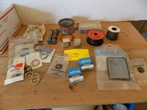 lot 75 image: 2- Mechanics wire 18 gauge rolls, 2-Bearings, Cutter keys, Shimms, Arctic Cat Chain