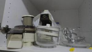 lot 221 image: Oster kitchen center, 2 bowls, mixer, food processer & 2 blender tops
