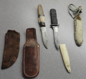 lot 252 image: Knives with leather holders