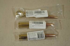 lot 35 image: Lucky Shot 50 Cal Bullet Casing Corkscrew, Tap Handle, and Bottle Opener