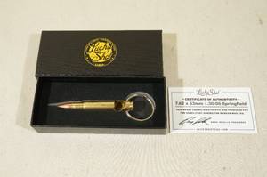 lot 37 image: Lucky Shot Vietnam War Era .30-06 Sprg Bullet Casing Keychain Bottle Opener