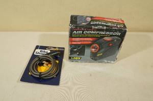 lot 71 image: Locking Bike Cable and Portable Air Compressor