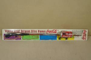 lot 83 image: Coca Cola Novelty Fishing Rod and Can Reel