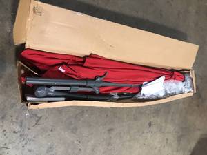 lot 19 image: 8.2 ft. x 8.2 ft. Hanging Cantilever Patio Umbrella in Red with Base  Customer Returns See Pictures