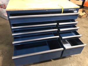 lot 36 image: Husky 52 in. W x 25 in. D Standard Duty 9-Drawer Mobile Workbench Cabinet with Solid Wood Top in Gloss Blue Customer Returns See Pictures
