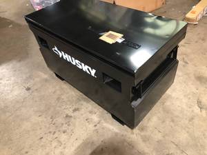 lot 38 image: Husky 48 in. W x 24 in. D Steel Job Site Tool Box in Black  Customer Returns See Pictures