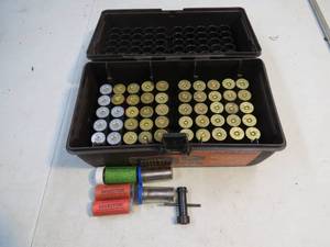 lot 56 image: Flambeau 100 Round Storage Case with 2 34 and 3 (50 total) Shells and an assortment of Chokes