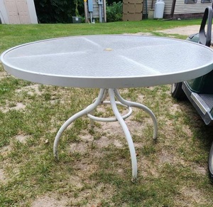 lot 64 image: 48 Glass Top Patio Table