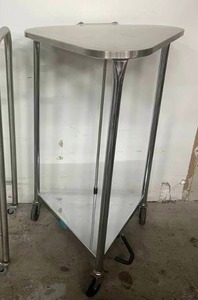 lot 25 image: MSRP $700 Pedigo Products Triangular Mobile Closed Lid Hamper - Stainless Steel Foot-Operated Linen Hamper with 18 Opening and Lid - Complete with Quiet-Close lid to help prevent lid from slamming and reducing odor - Great Condition